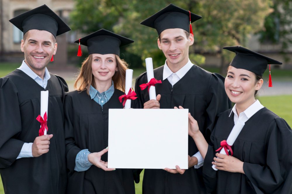 graduation-concept-with-students-holding-blank-certificate-template.jpg